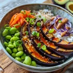 Close-up of a Miso Aubergine Rice Bowl with vibrant ingredients.
