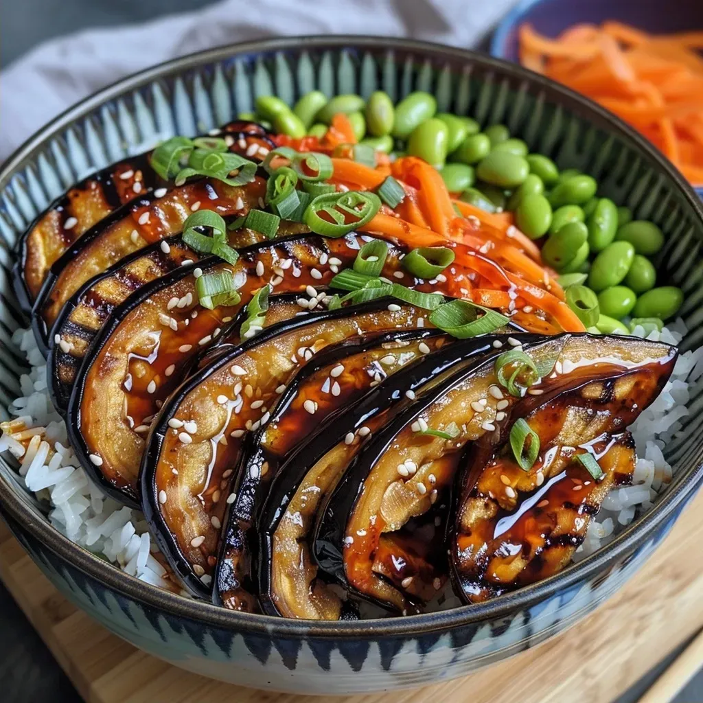 Side view of a delicious Miso Aubergine Bowl filled with colorful vegetables.
